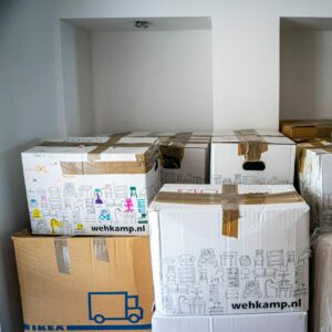 Cardboard moving boxes, stacked and packed for a move.